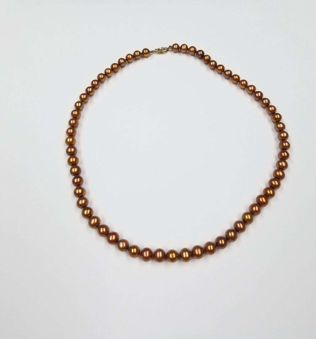 Cultured freshwater pearl strand necklace in brown color