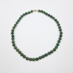 Nephrite Jade necklace in green color beads